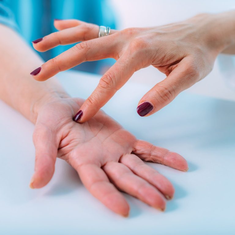 examining-the-hand-of-a-senior-patient-with-carpal-2024-10-18-08-58-43-utc (2)